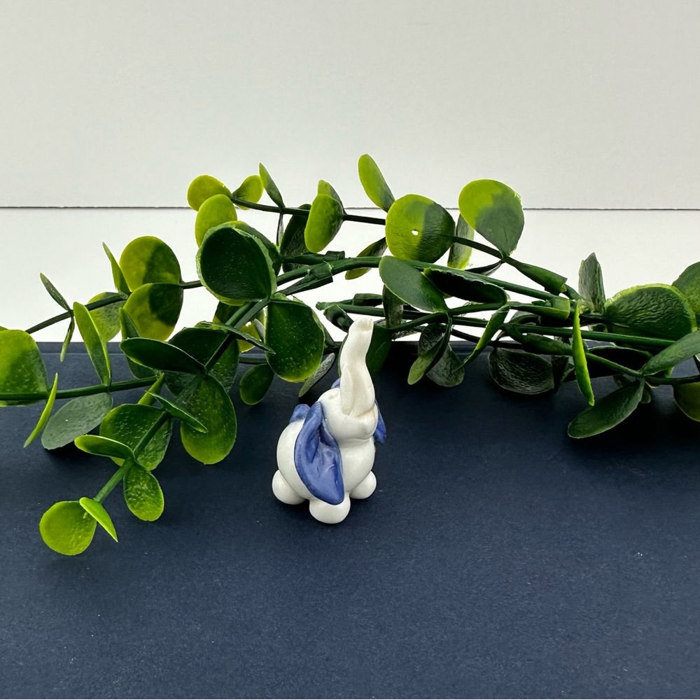 Vintage Mini Elephant Figurine with blue ears